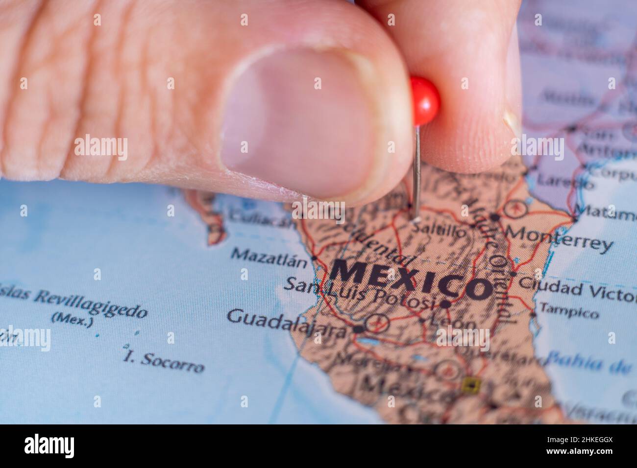 Mexico pin on a world map. Mexico travel destination planning pinned Stock Photo
