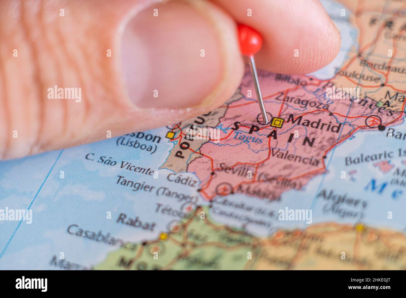 Spain pin on a world map. Spain travel destination planning pinned Stock Photo