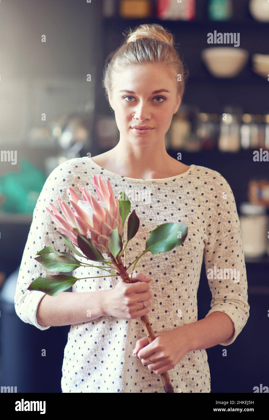 Fresh flowers to brighten up her home Stock Photo Alamy