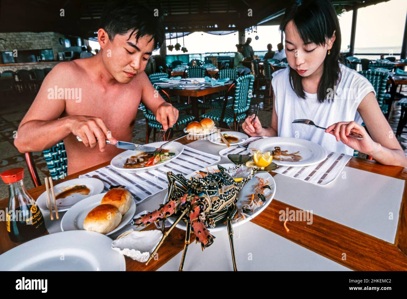 Asian couple, resort hotel restaurant, Mactan Island, Cebu, Philippines Stock Photo