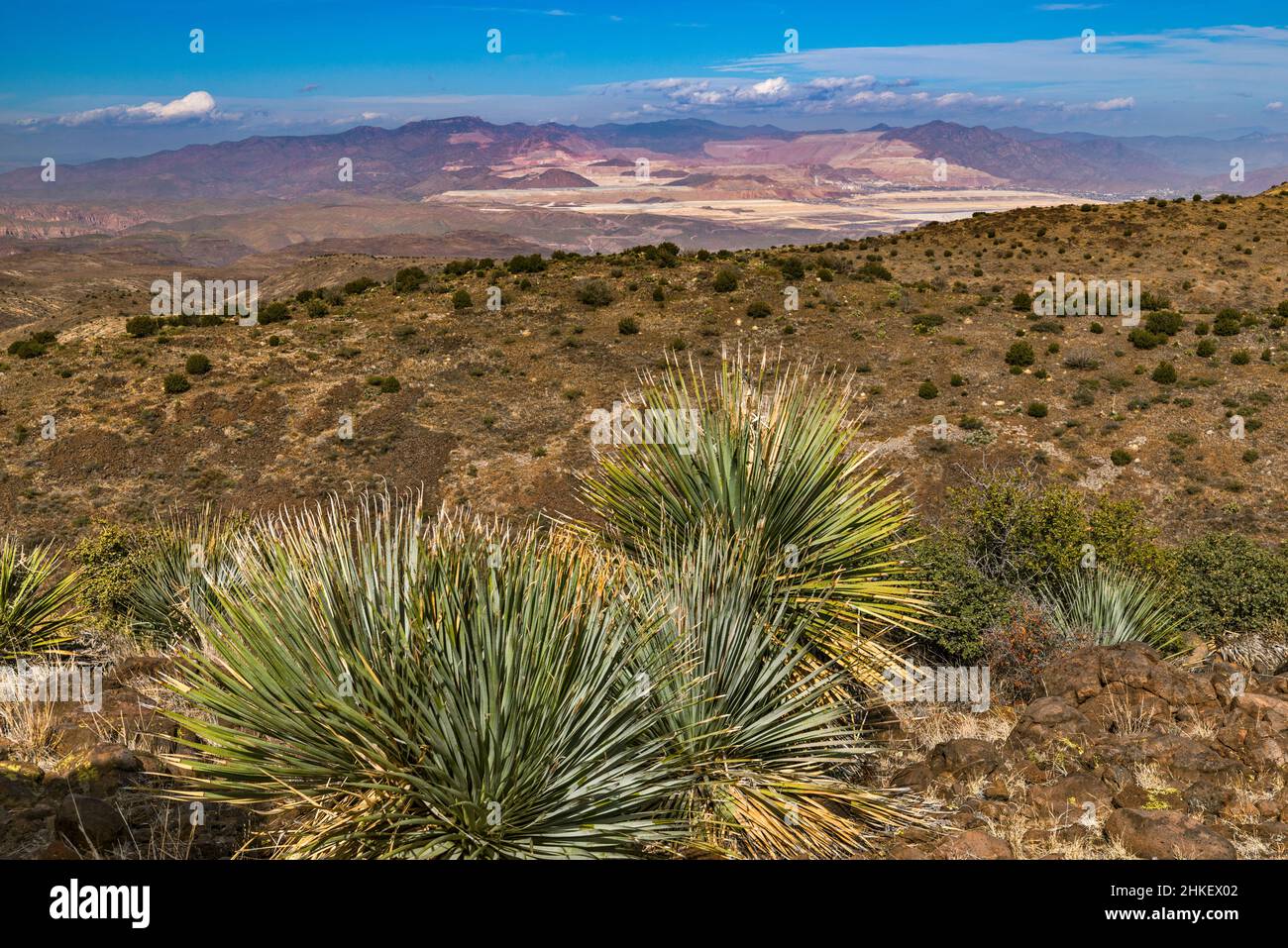 Morenci openpit copper mine in far dist 12 m N, White Mountains behind