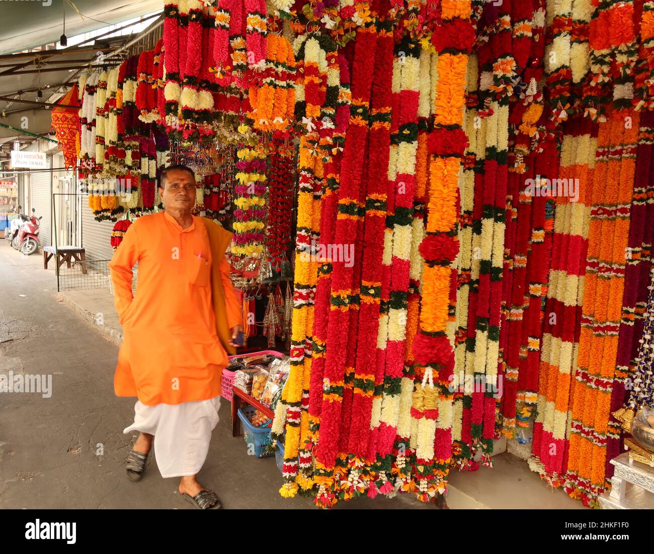 Smiling Indian man wearing the colourful traditional clothing, Little India, Phahurat, Chinatown, Bangkok, Thailand Stock Photo