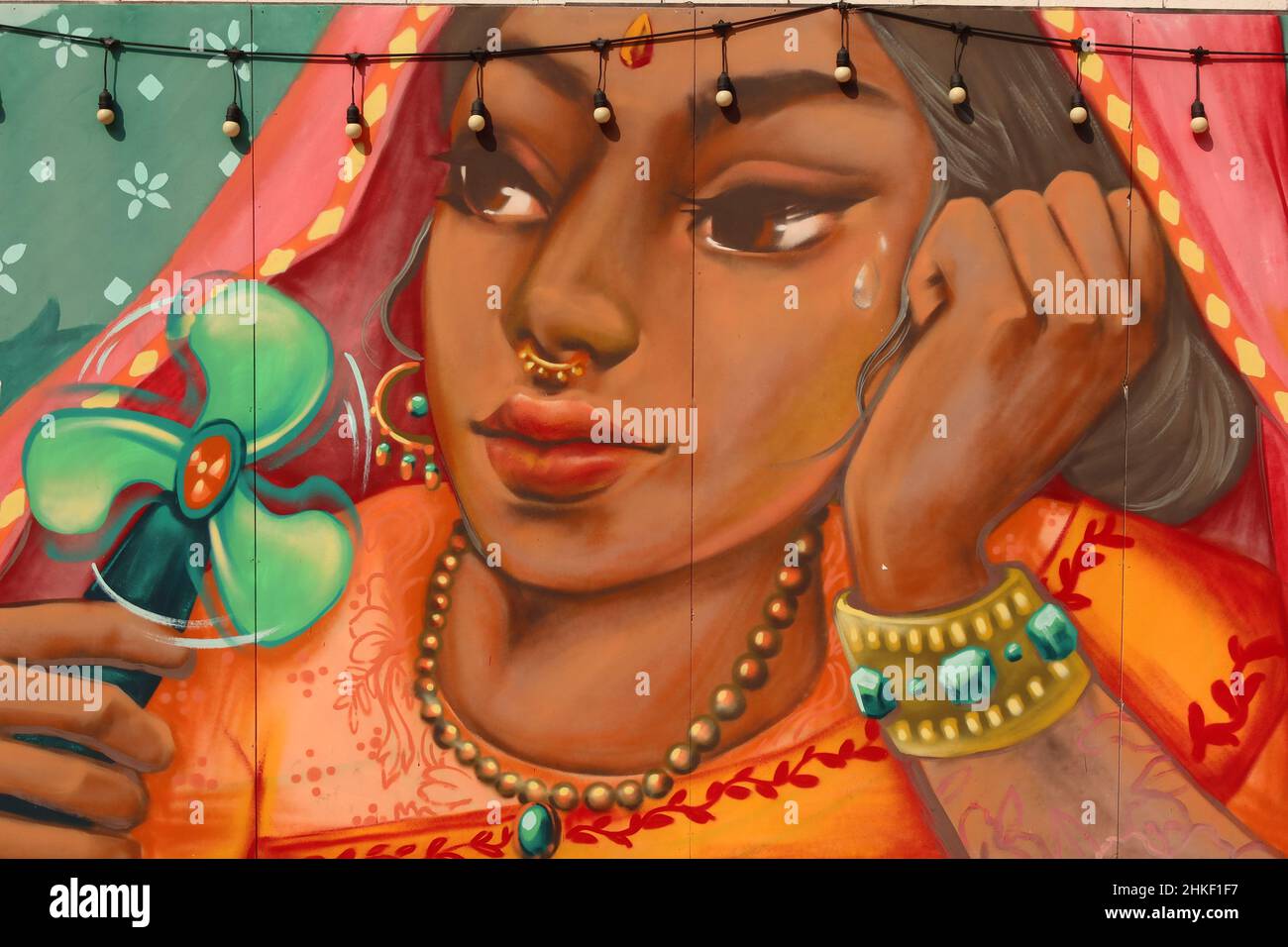 Wall painting of an Indian woman on Ong Ang Walking Street by Klong Ong Ang, Chinatown, Phahurat, Bangkok, Thailand, Stock Photo