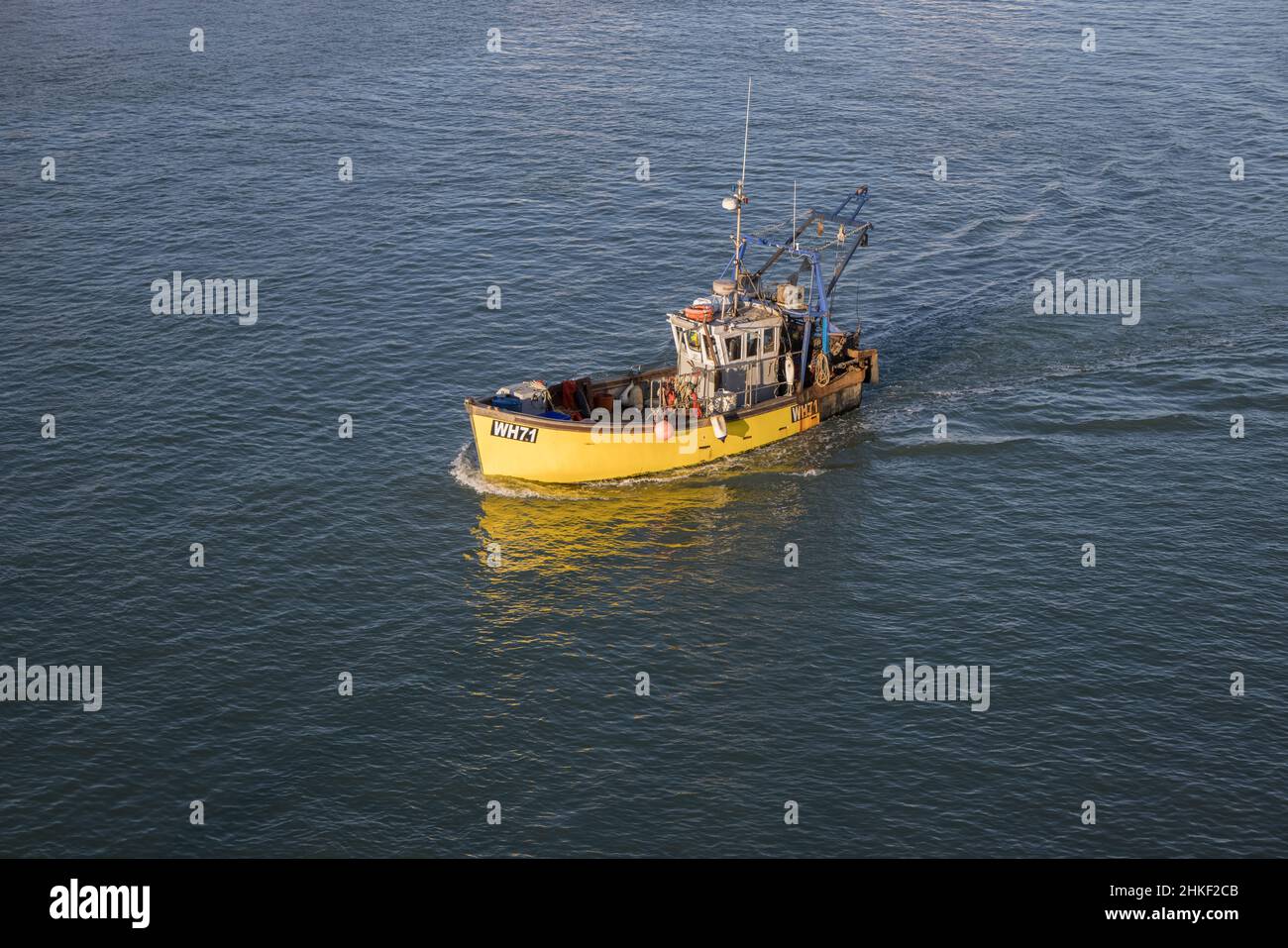 Yellow fishing boat hi-res stock photography and images - Alamy