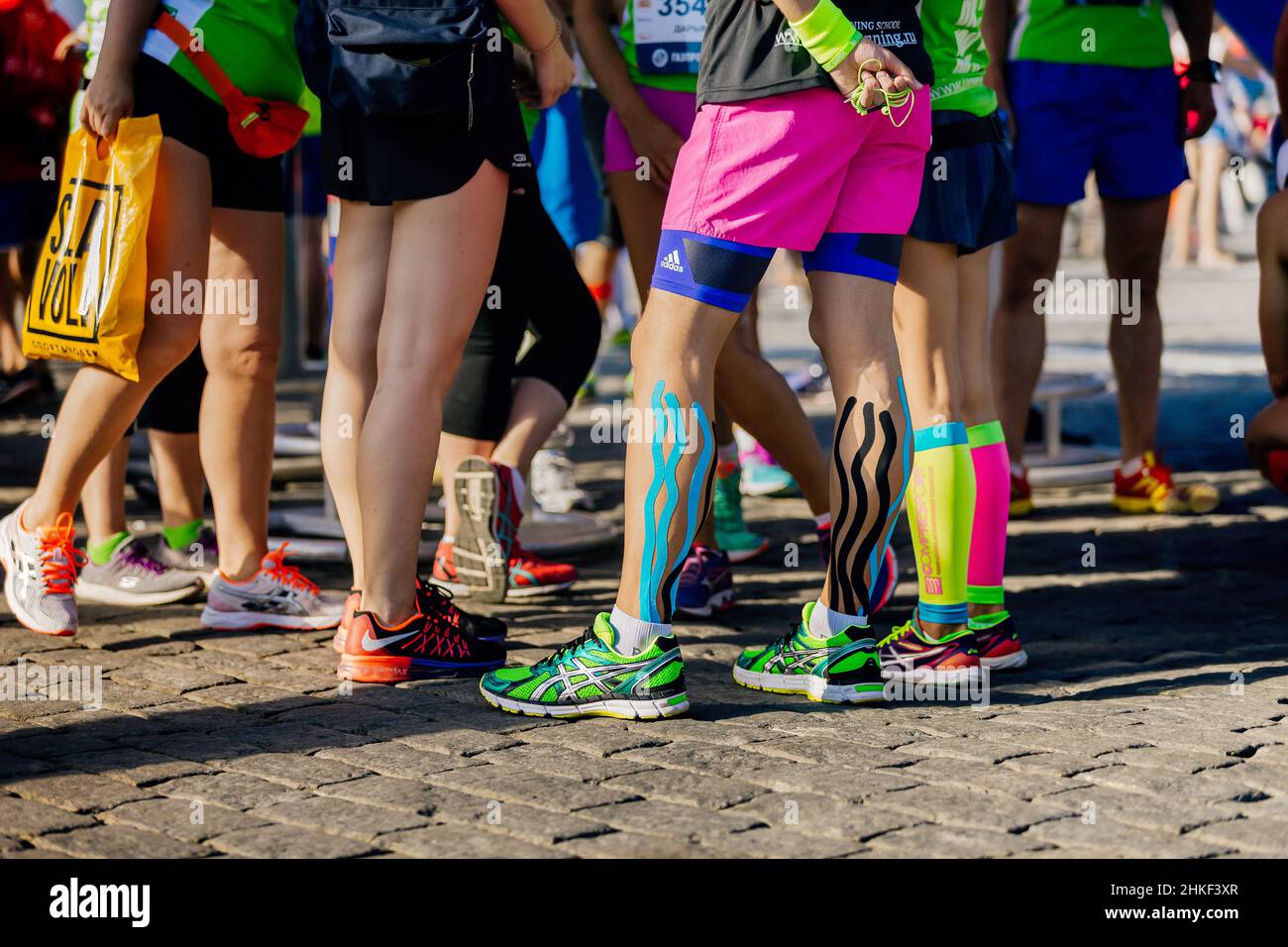 Ekaterinburg, Russia - August 7, 2016: legs girl runners in running shoes  Asics and Nike in Europe-Asia marathon Stock Photo - Alamy