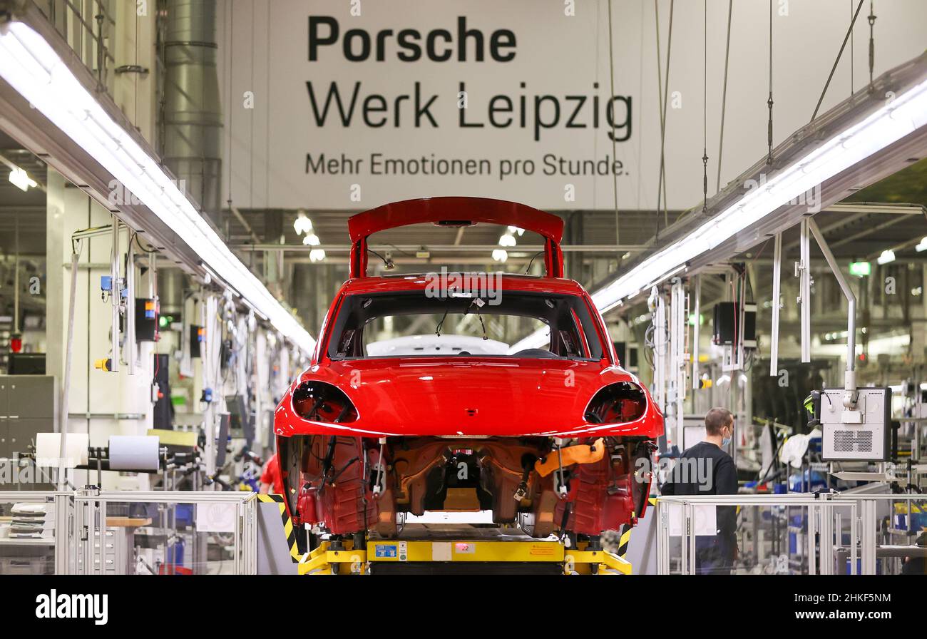 Leipzig, Germany. 02nd Feb, 2022. A Porsche Macan leaves the 'interior line' at the Porsche plant in Leipzig. The automaker will begin series production of the E version of its successful Macan model in Leipzig in 2023. Credit: Jan Woitas/dpa-Zentralbild/dpa/Alamy Live News Stock Photo