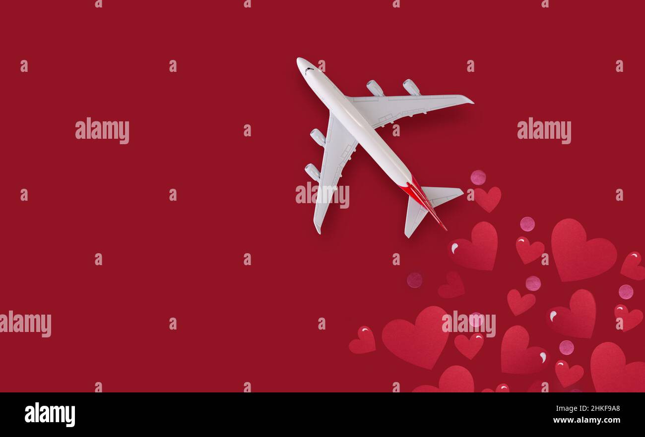 Romantic concept banner with plain and paper hearts. Stock Photo