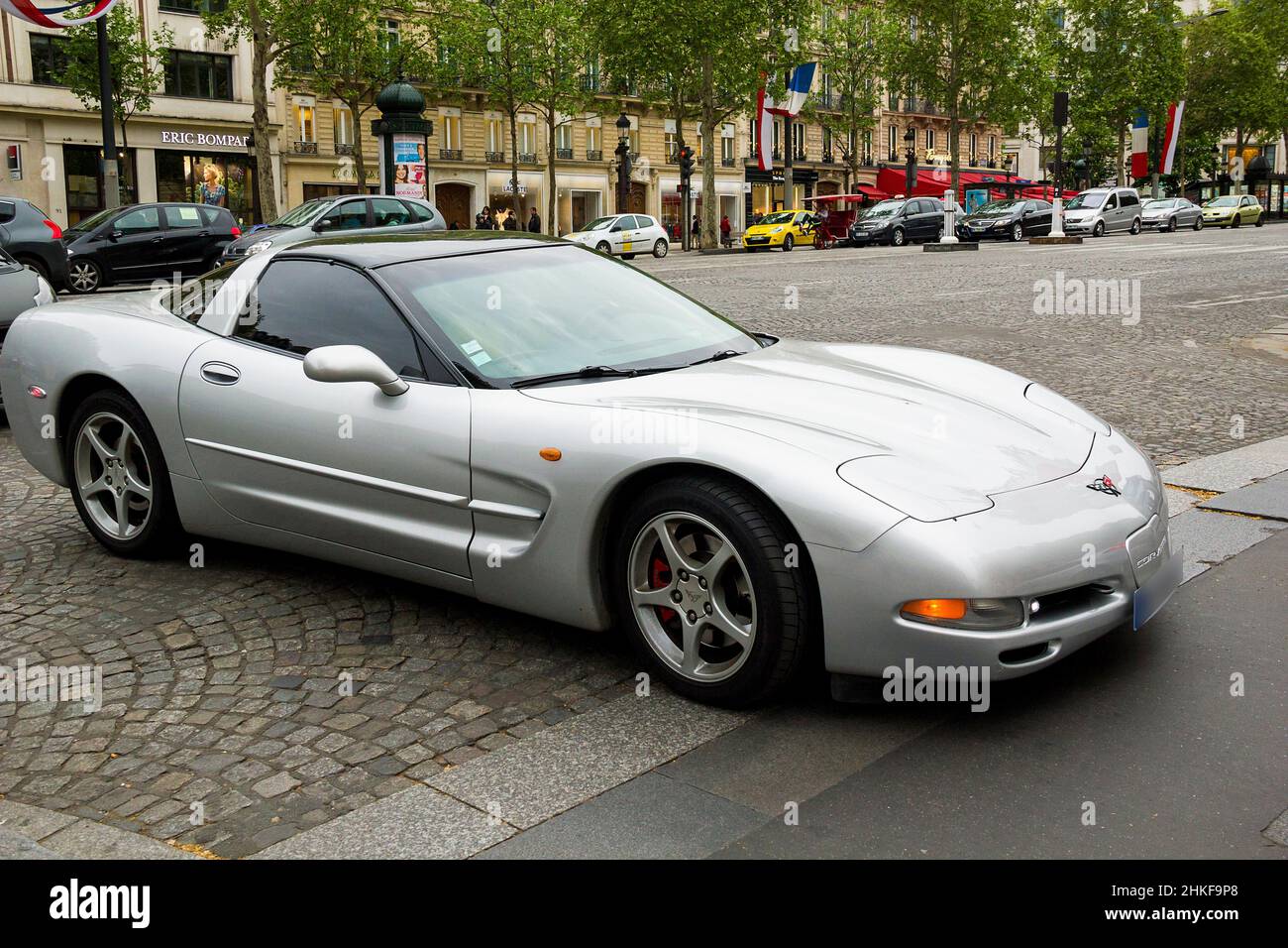 This is a luxury French car Chevrolet Corvette C5 moving down the street May 12, 2013 in Paris, France. Stock Photo