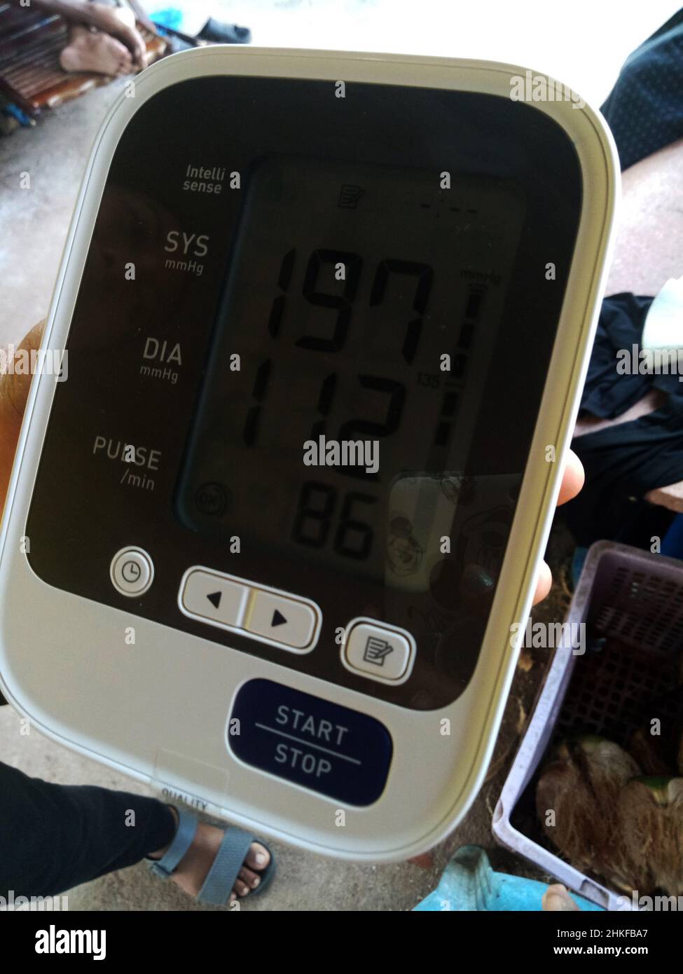 Doctor visit and use Sphygmomanometer upper arm blood pressure meter