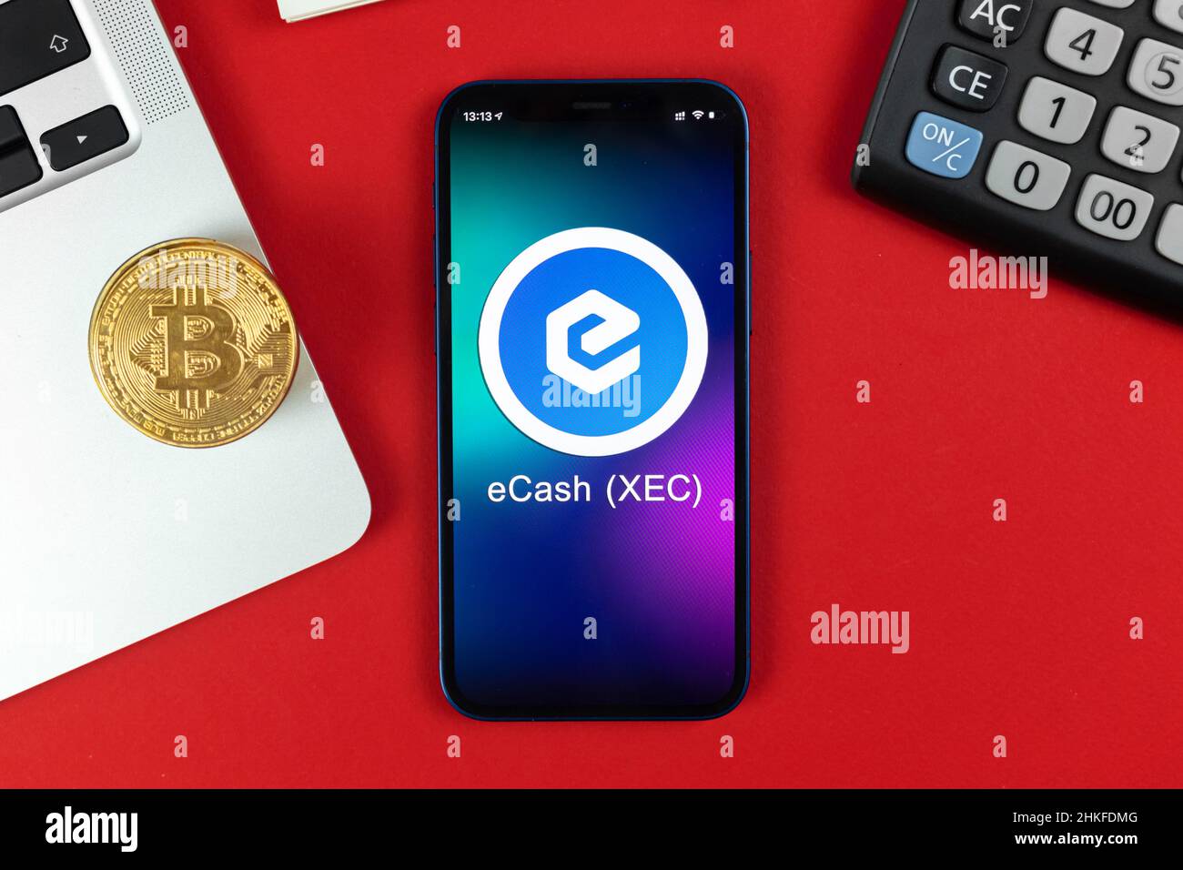 Ecash XEC cryptocurrency symbol, logo. Business and financial concept. Hand  with smartphone, screen with crypto icon closeup Stock Photo - Alamy