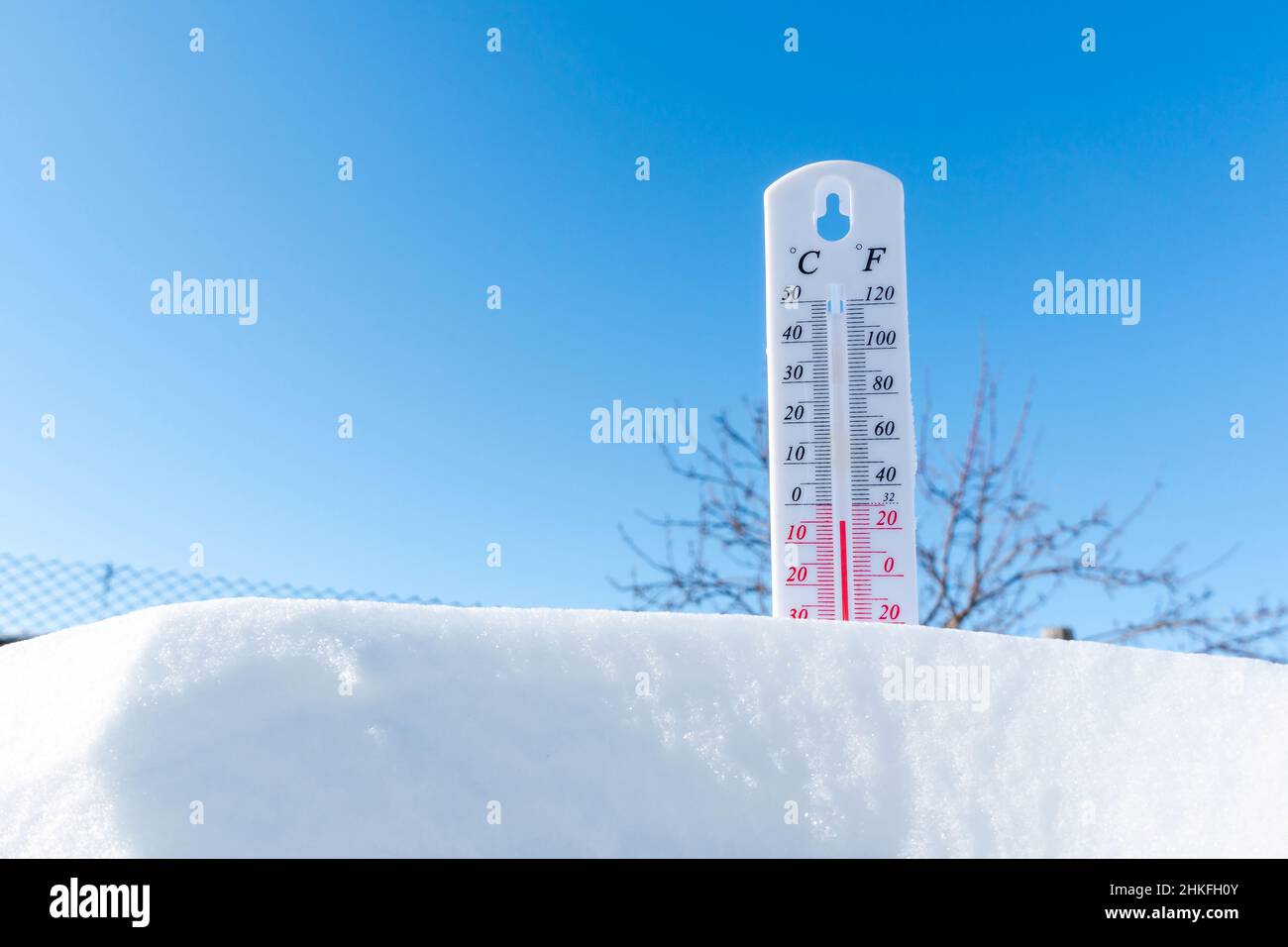 Thermometer in the snow. Climate, weather, forecast. Temperatures