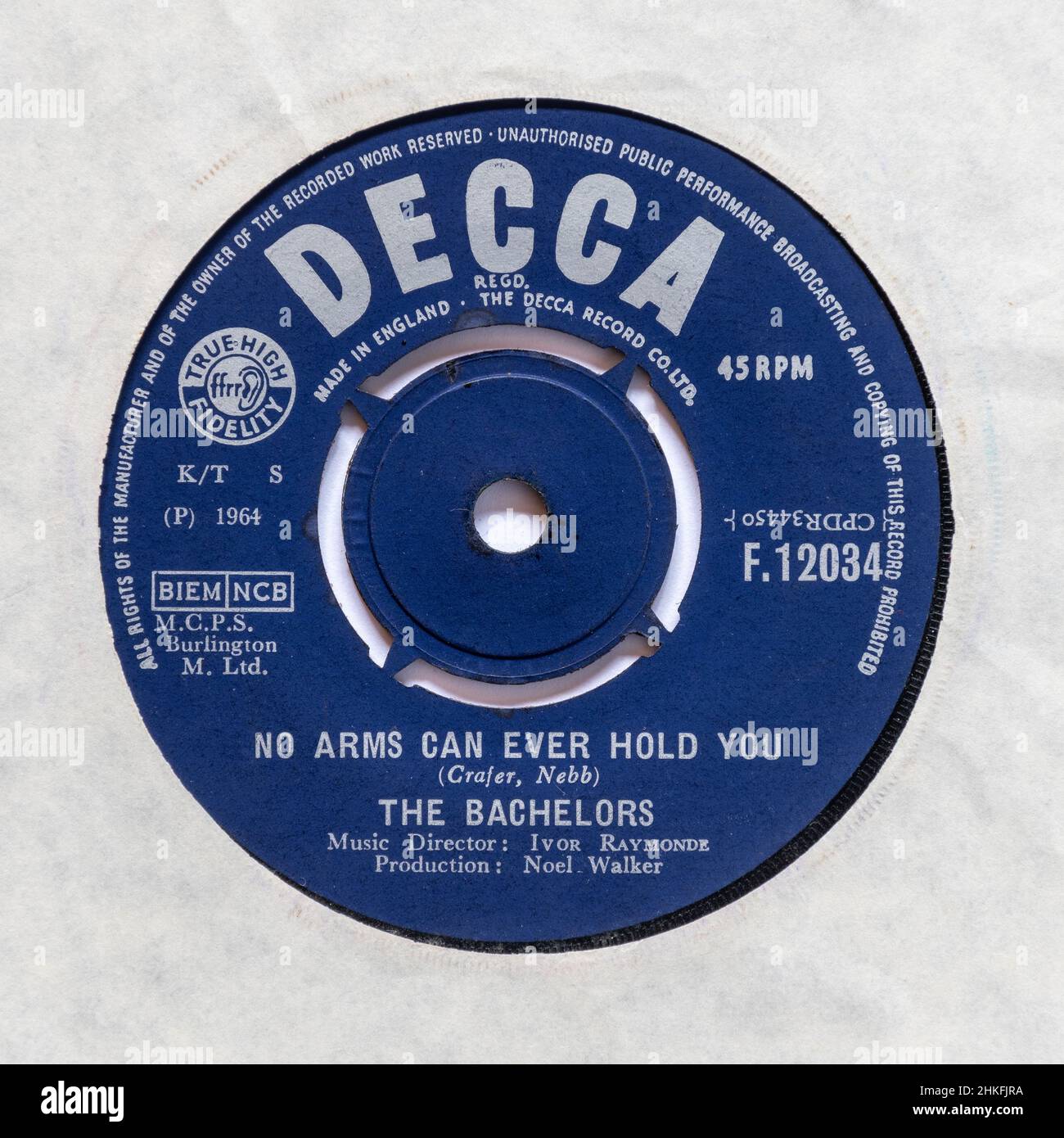 No arms can ever hold you, by The Bachelors, a stock photo of the 7' single vinyl 45 rpm record Stock Photo