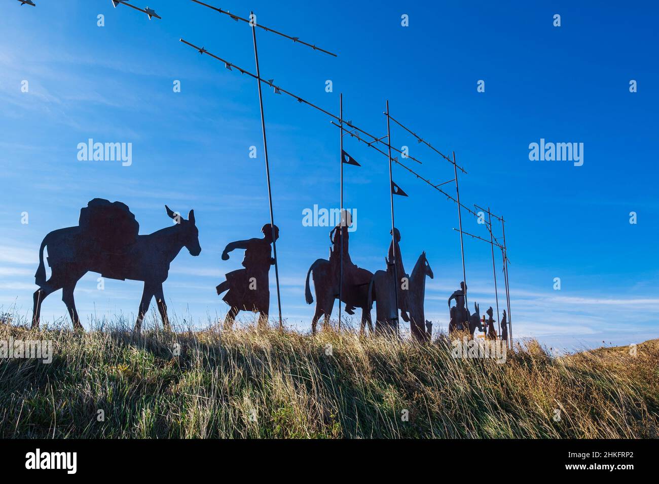 Spain, Navarre, surroundings of Zariquiegui (Zarikiegi), Alto del Perdon (alt : 770m), pass on the Camino Francés, Spanish route of the pilgrimage to Santiago de Compostela, listed as a UNESCO World Heritage Site, metal sculpture by Navarrese sculptor Vicente Galbete representing a procession of pilgrims and entitled Where the route of the wind crosses that of the stars Stock Photo