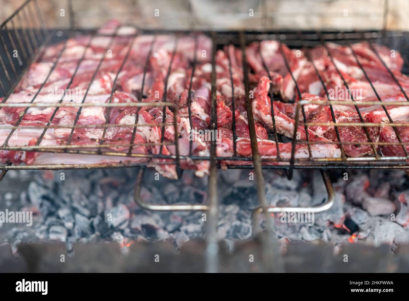 Lamb ribs cooked over an open fire, close-up. Lamb chops Grilling ...