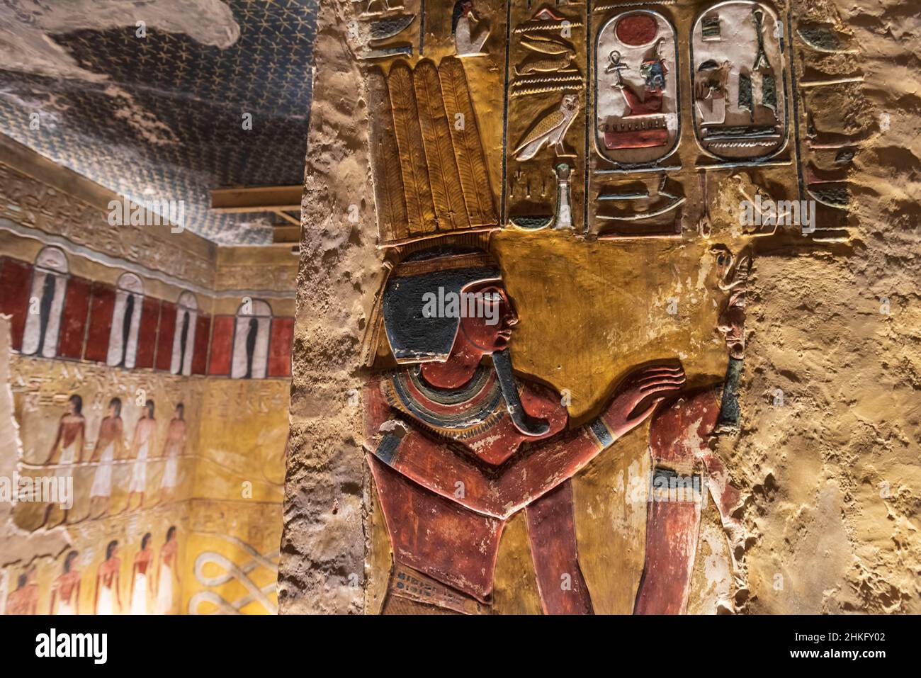 Egypt, Upper Egypt, Nile Valley, Luxor, Valley of the Kings, listed as World Heritage Site by UNESCO, colourful bas relief depicting Pharaoh on a wall of the tomb of Seti I Stock Photo