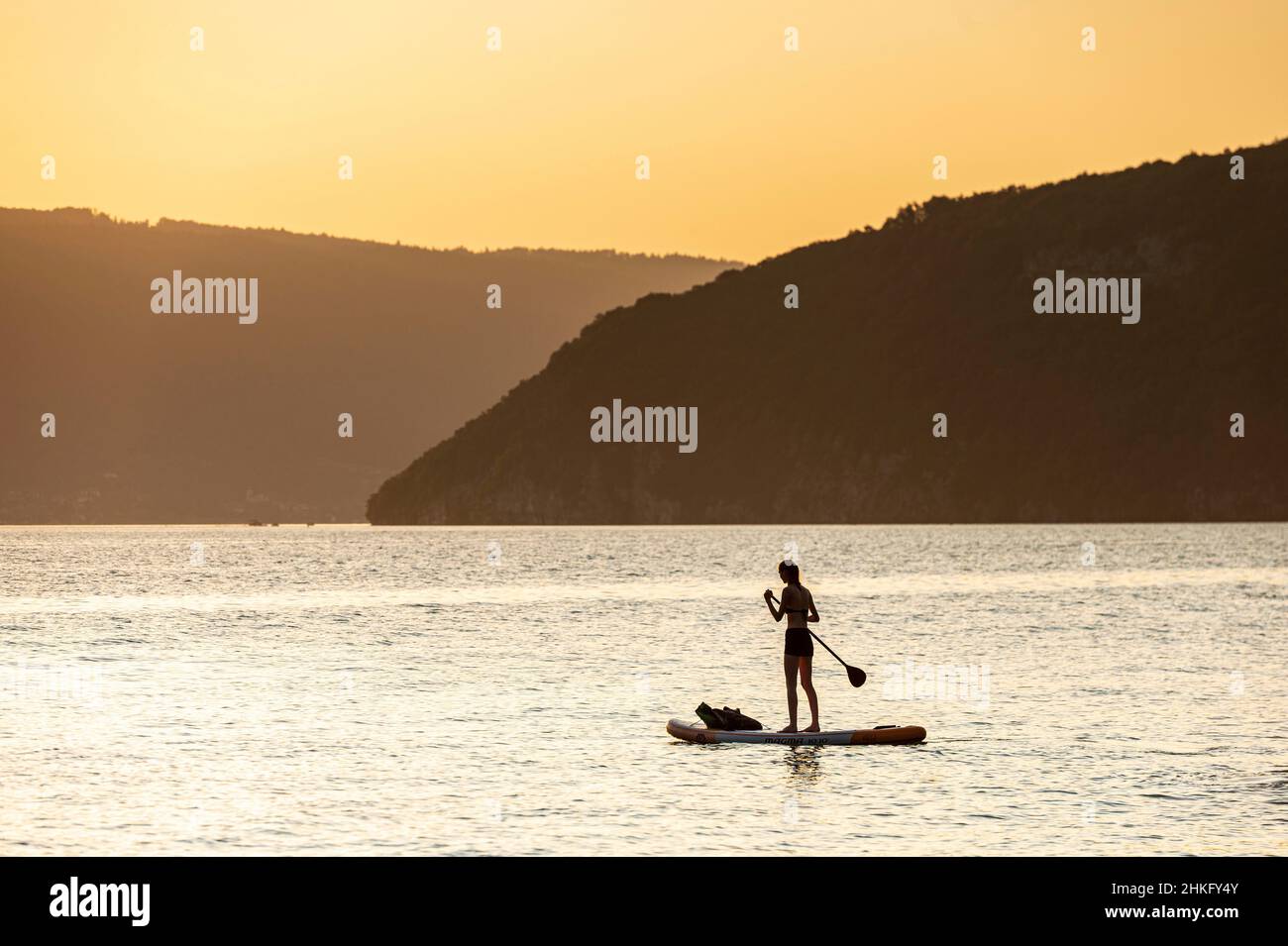 France, Haute-Savoie (74), Annecy, Lake Annecy, stand up paddle at sunset Stock Photo