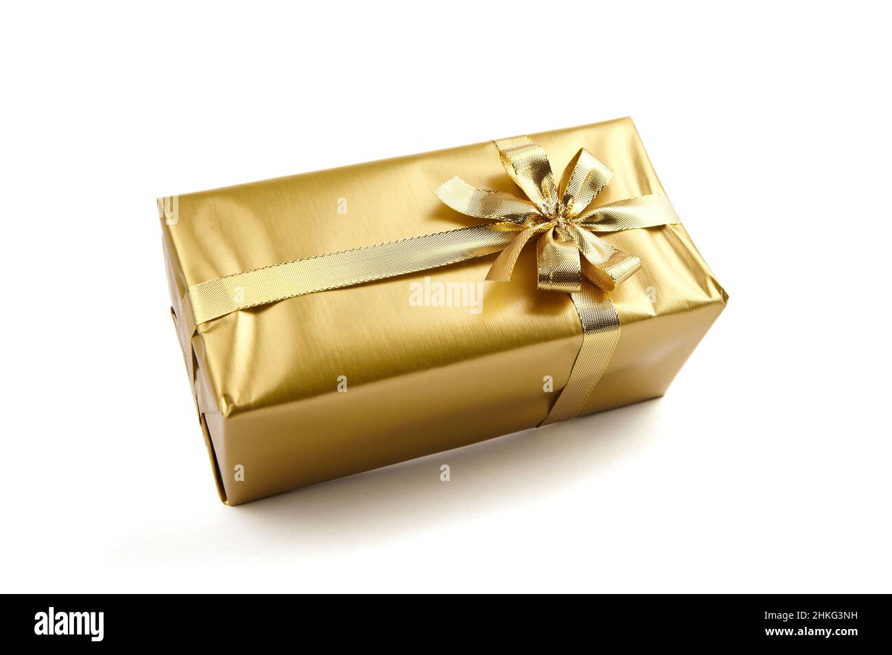 Gift box with golden bow isolated on white background Stock Photo - Alamy