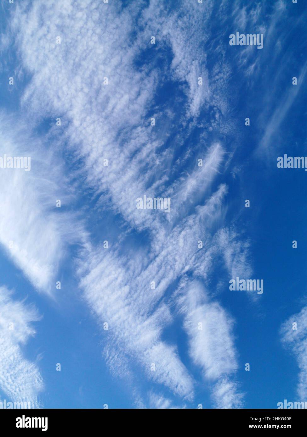 Blue sky with white spindrift clouds Stock Photo