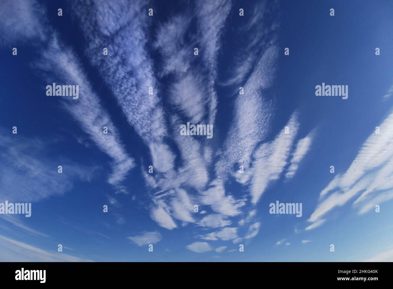 Blue sky with white spindrift clouds Stock Photo