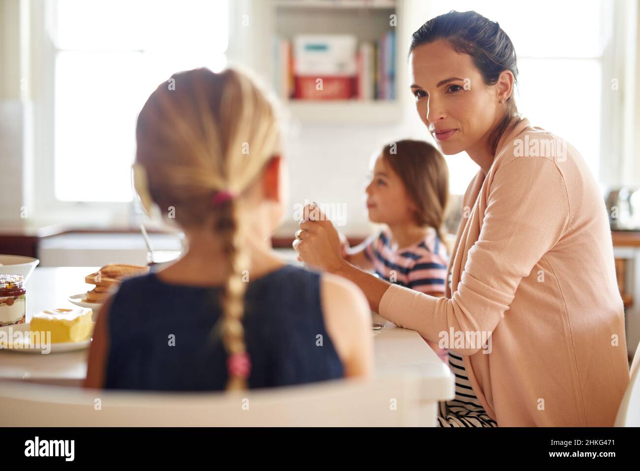 Having fun at the breakfast table. Shot of a family having breakfast together. Stock Photo
