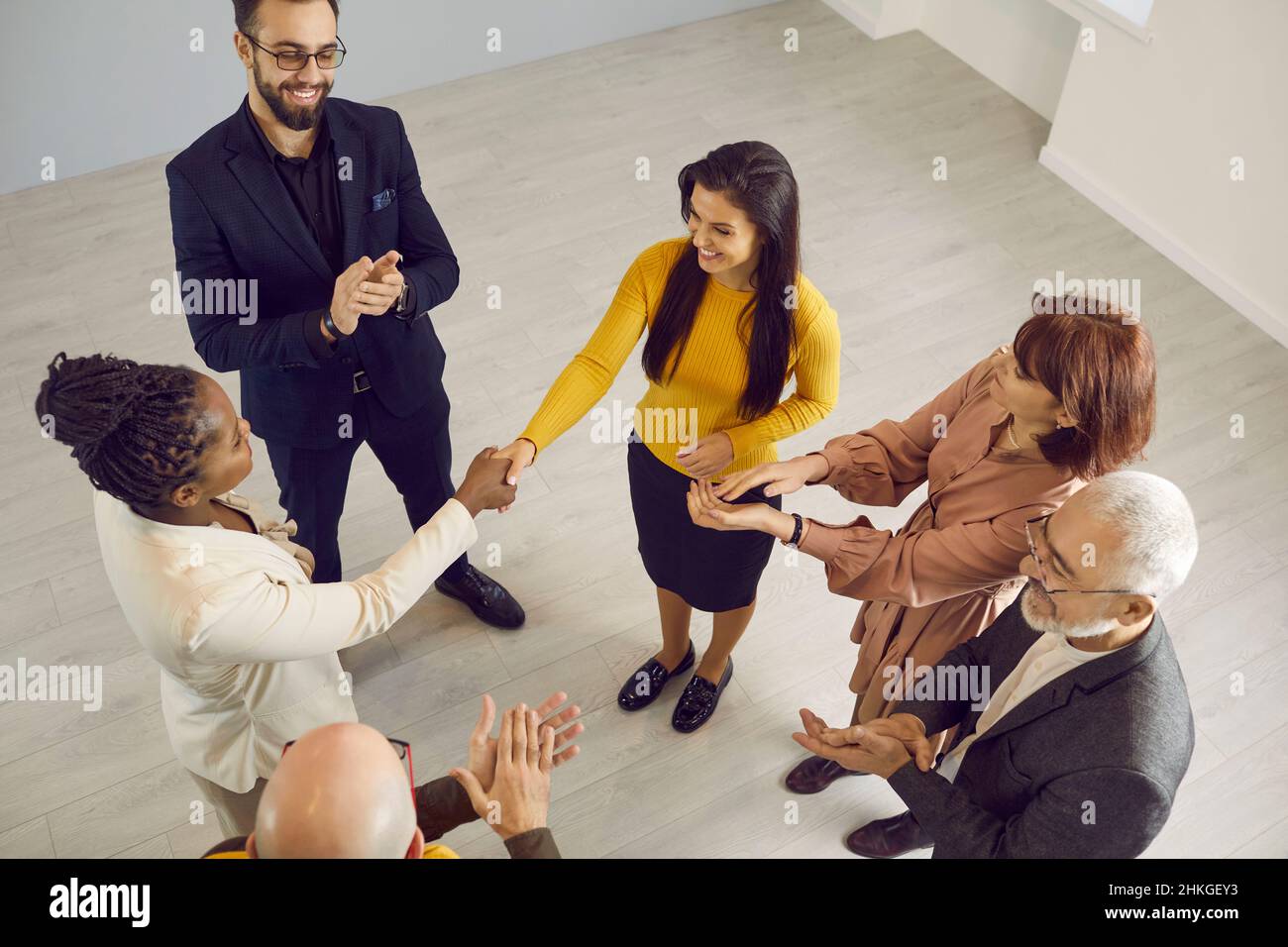 Diverse businesswomen handshake get acquainted Stock Photo
