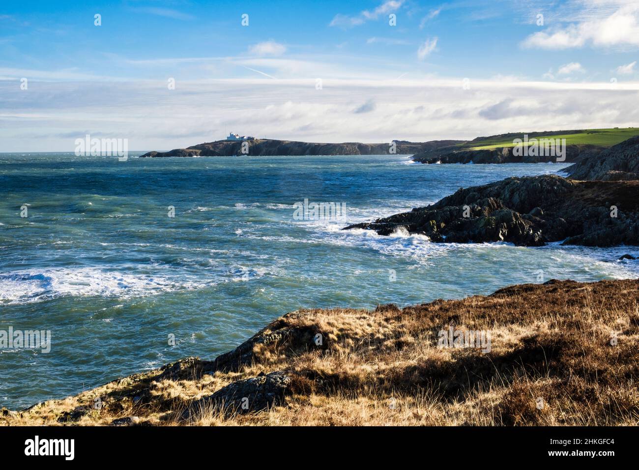 View along rocky coastline to Point Lynas. Amlwch, Isle of Anglesey, north Wales, UK, Britain Stock Photo