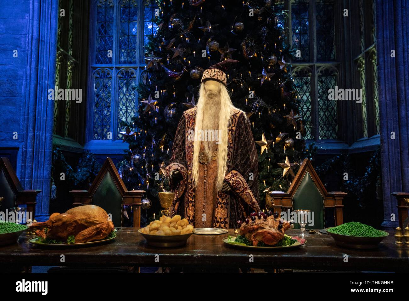 Leavesden, UK - January 9th 2022: A festive Great Hall of Hogwarts, and Dumbledore costume, at The Making of Harry Potter tour at the Warner Bros. Stu Stock Photo