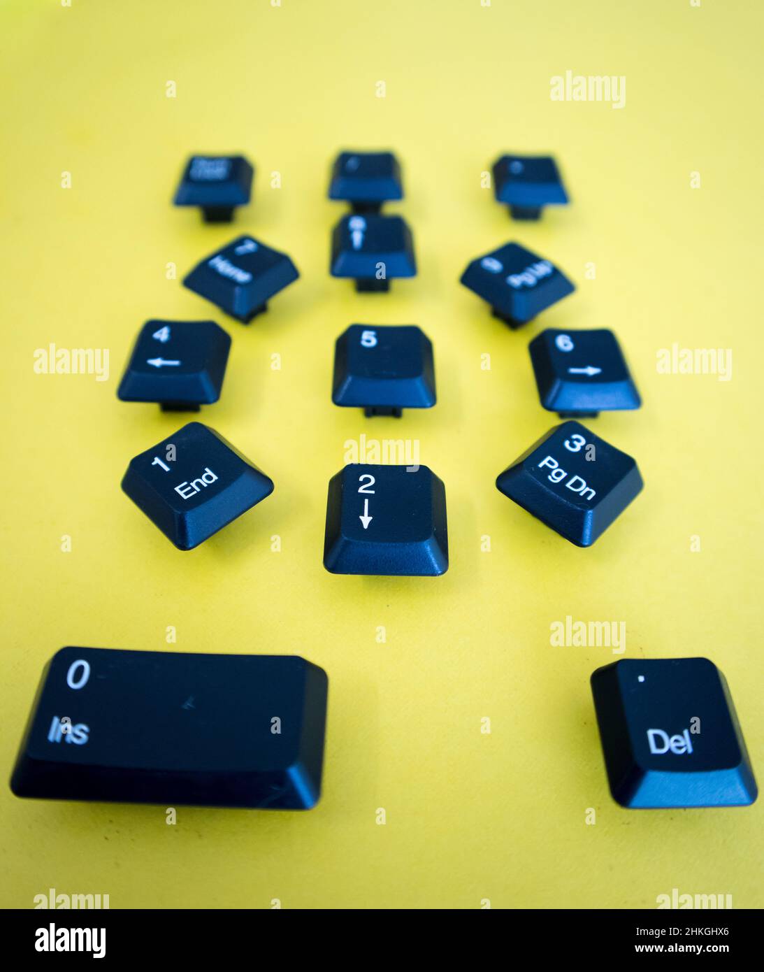 Numeric Keyboard keys placed in a paper in round shape design Stock
