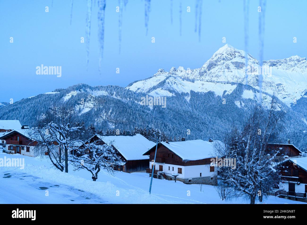 A small village like town on top of a snow covered mountain in France ...