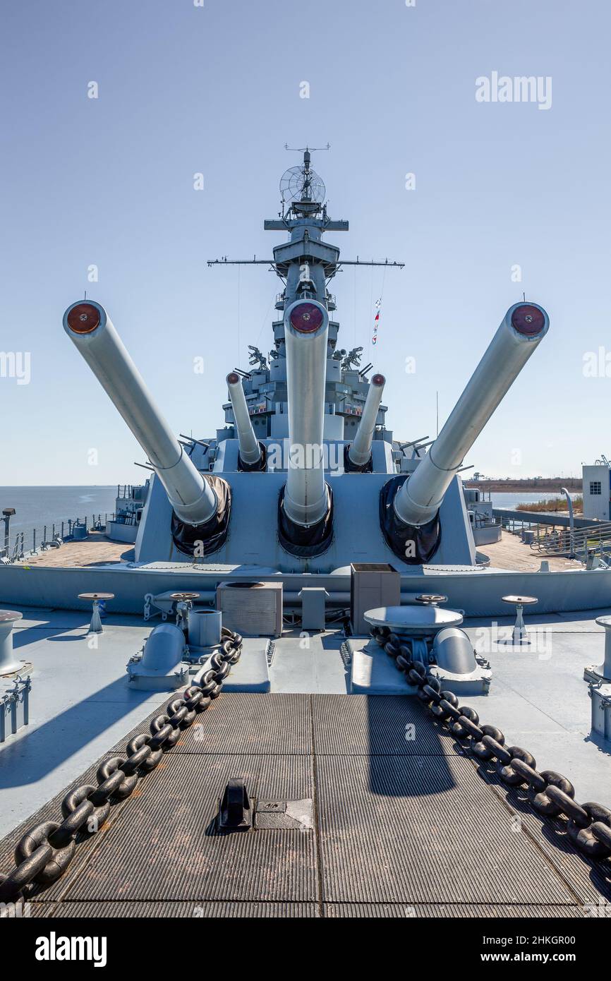 Forward guns of the USS Alabama (BB-60), a battleship that served in World War II.  Concepts could include history, war, defense, navy, other. Stock Photo