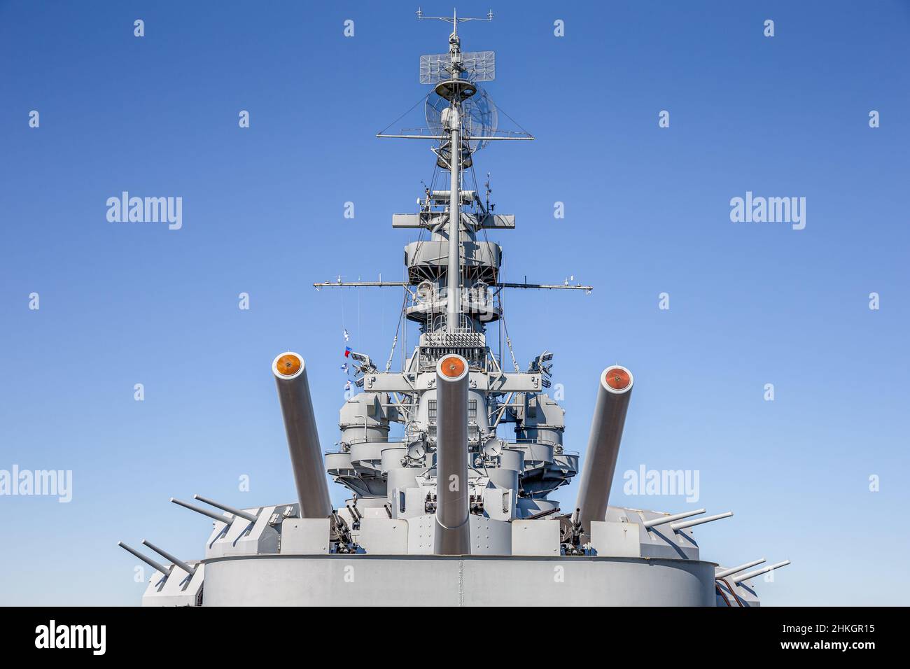 Rear guns of the USS Alabama (BB-60), a battleship that served in World War II.  Concepts could include history, war, defense, navy, other. Stock Photo