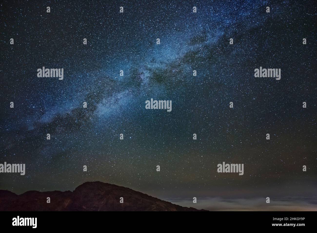 The milky way above the crater rim of the Caldera de Taburiente in La Palma, Spain. Stock Photo