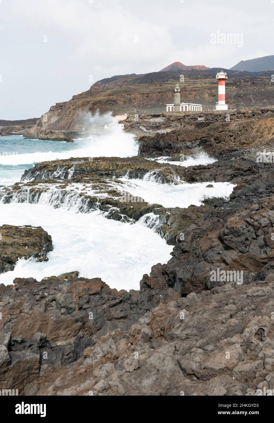 The two lighthouses in Fuencaliente, La Palma, Spain with tall waves on the rocks. Stock Photo