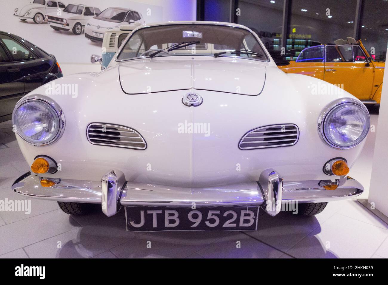The bonnet and grill of a white Volkswagen Karmann Ghia sports coupé classic car Stock Photo
