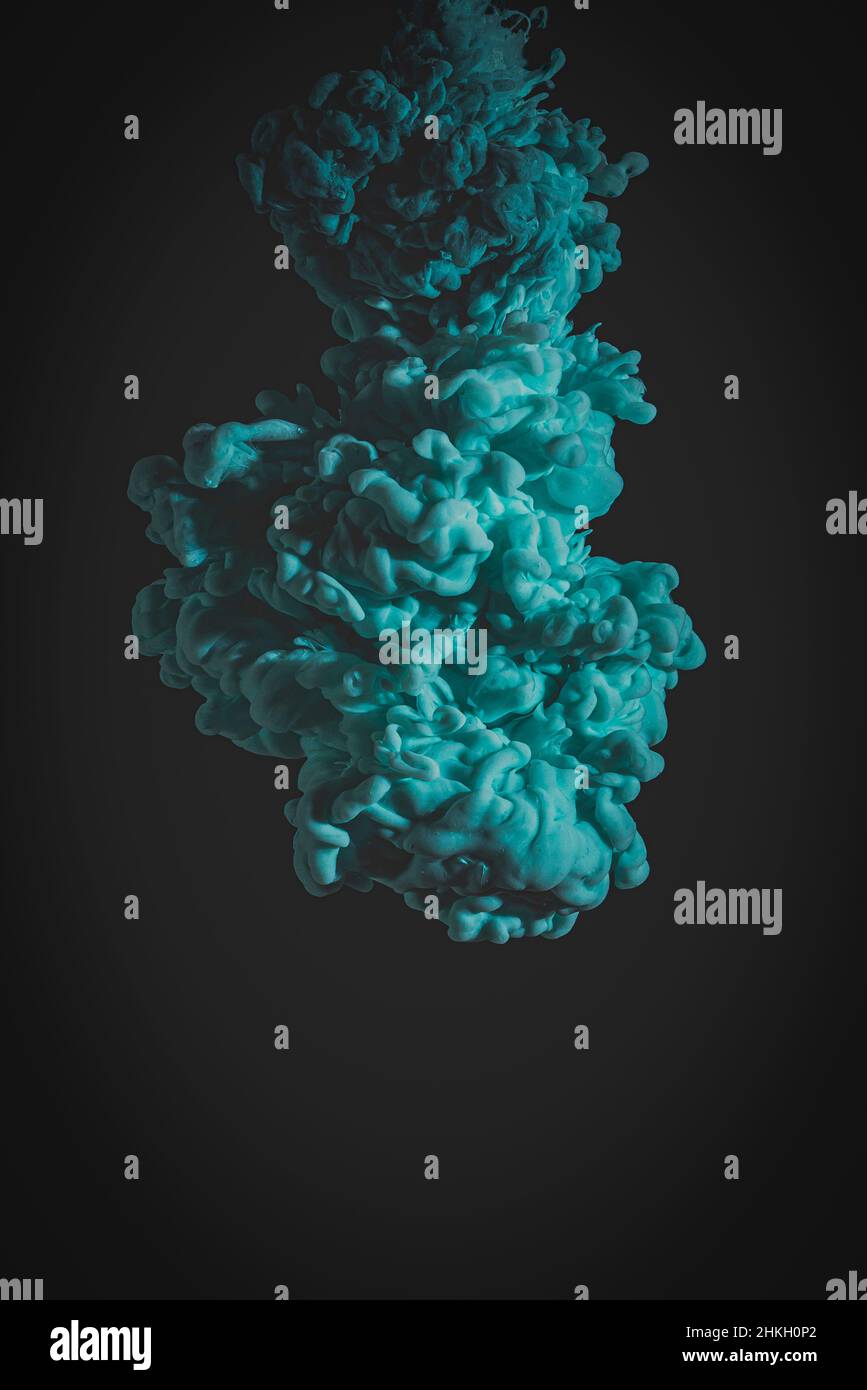 blue-green cloud on a black background. Stock Photo