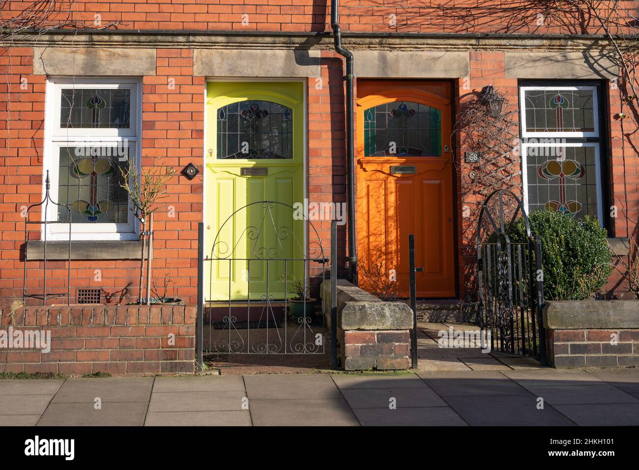 Brightly coloured front doors in a city suburb. Newcastle upon Tyne, UK. Stock Photo