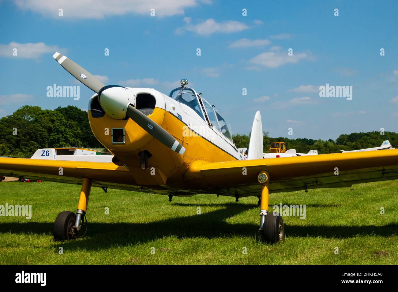 Yellow and white De Havilland Chipmunk with Lycoming engine, now a Supermunk. At Husbands Bosworth airfield, home of the Gliding Center. Stock Photo