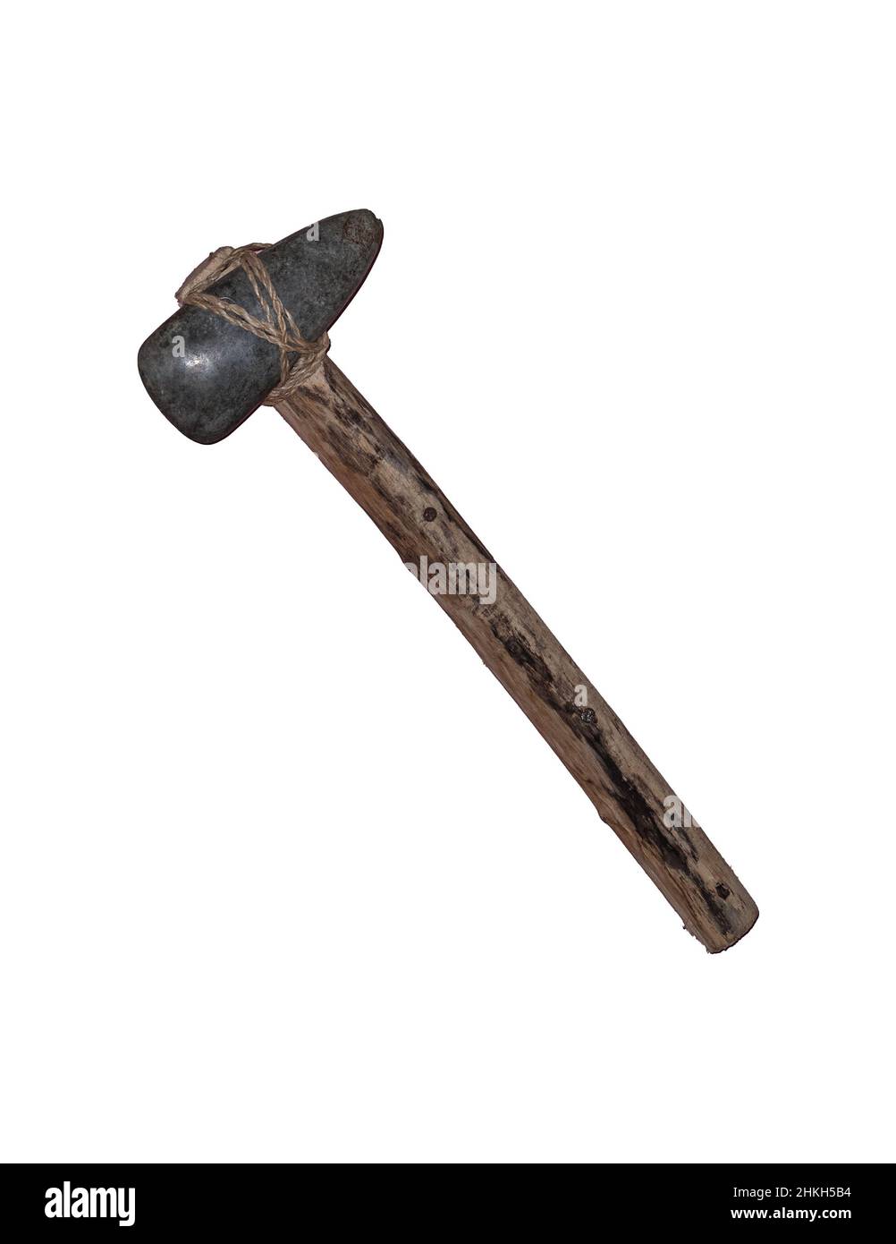Honed and polished stone ax is mounted on a stick.  Cut out on white background. Stock Photo