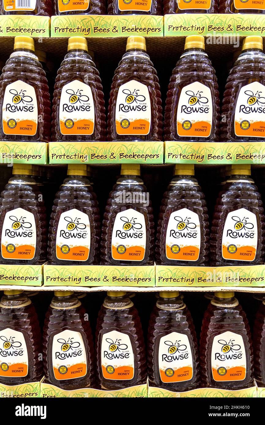 Bottles of runny Rowse Honey at a supermarket Stock Photo