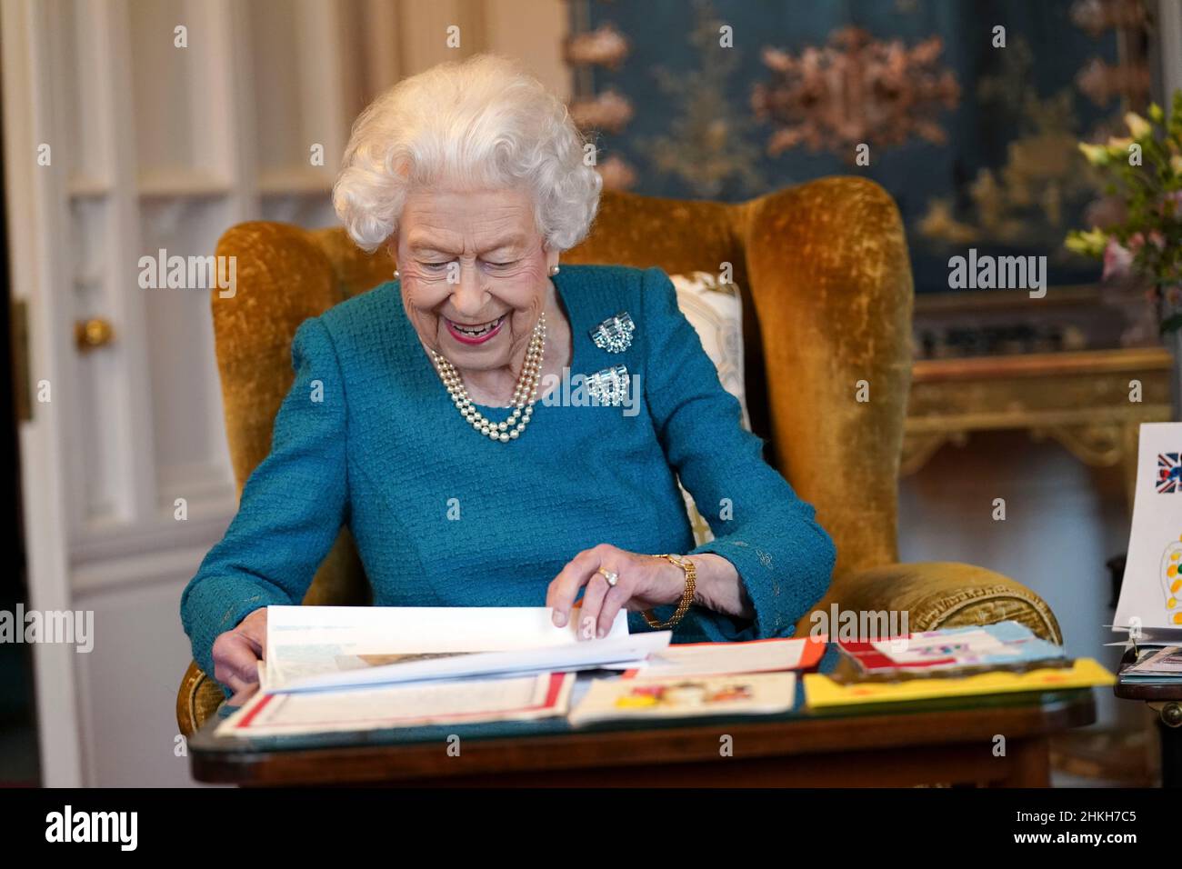 Queen Elizabeth II views a display of memorabilia from her Golden and