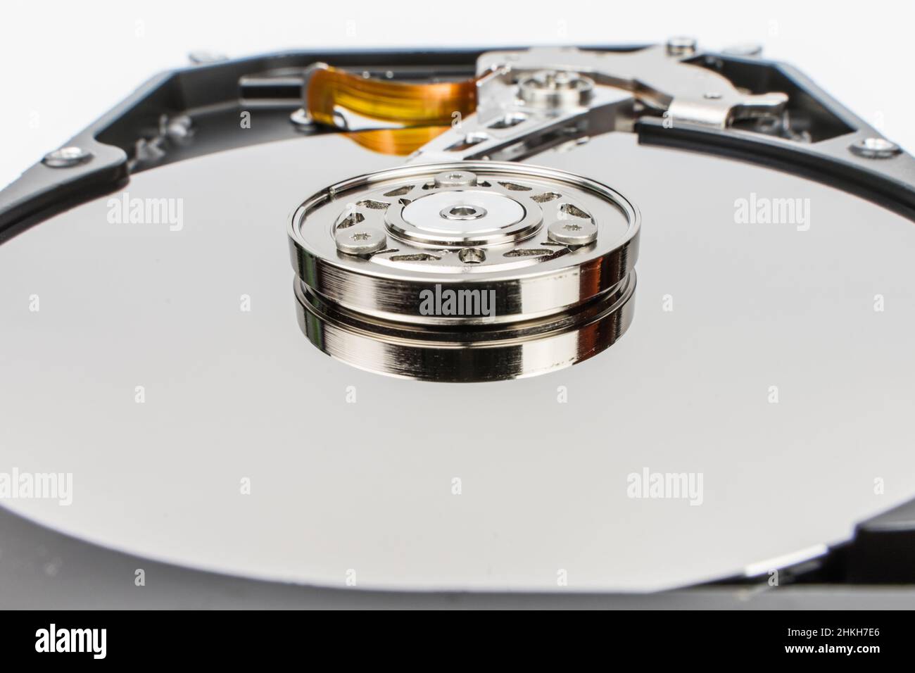 Closeup photo of the inside of a hard drive on a white background Stock Photo Alamy