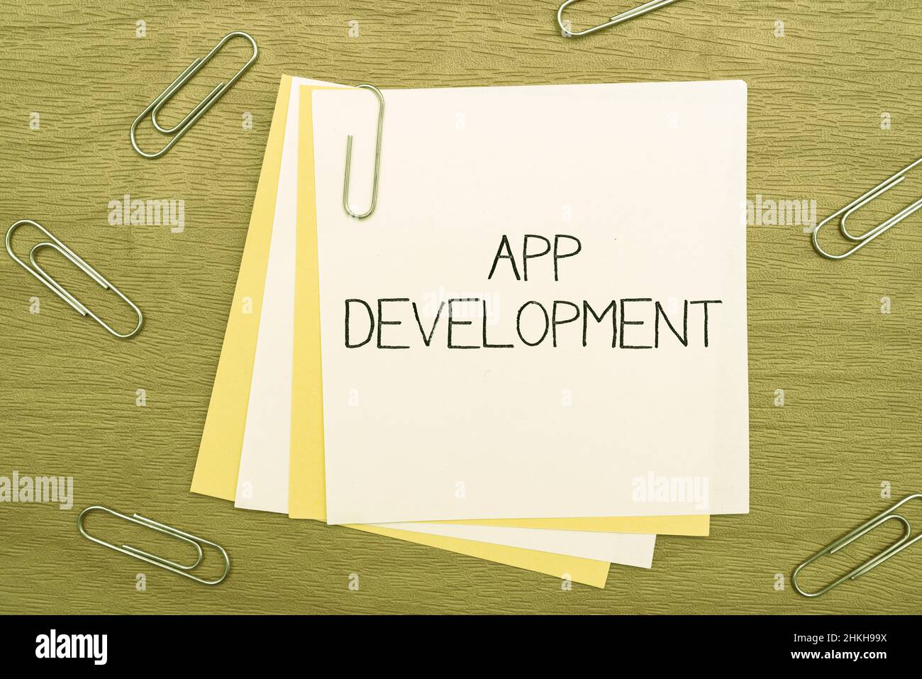 Handwriting text App Development. Business showcase Development services for awesome mobile and web experiences Multiple Assorted Collection Office Stock Photo