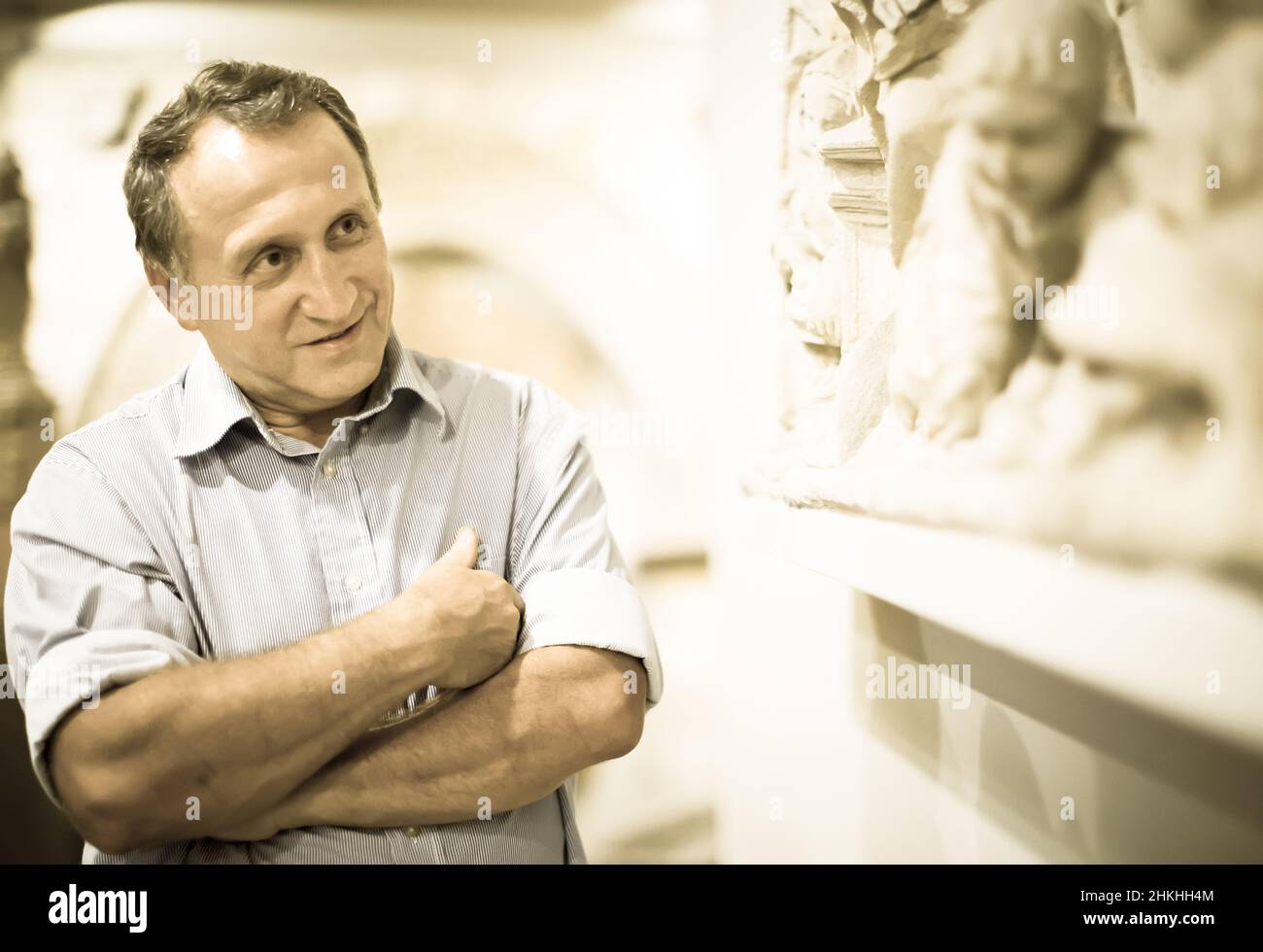 mature man examines the exhibit in historical museum Stock Photo