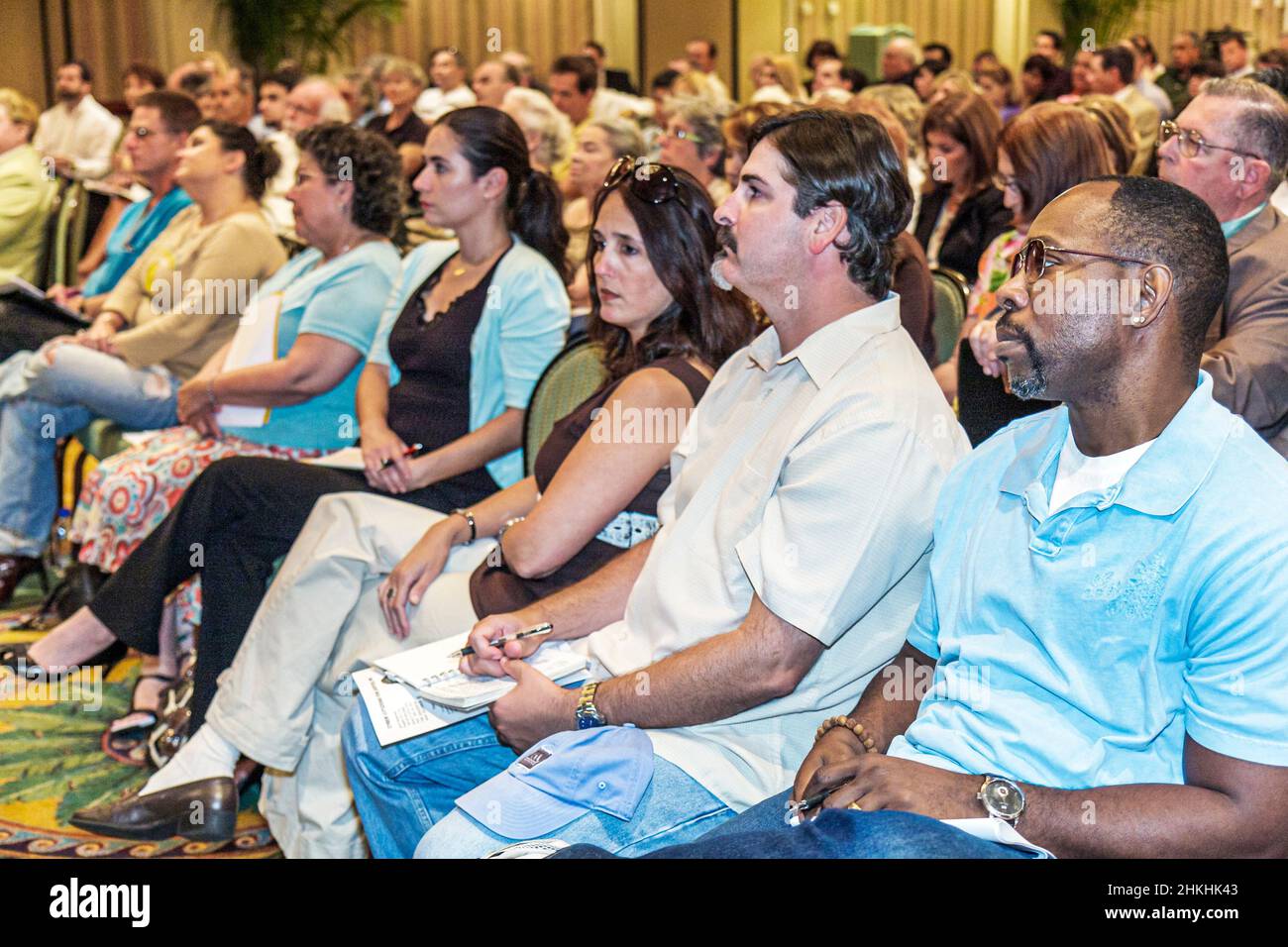 Miami Beach Florida,Special Town Hall Meeting,Condominium Foreclosure Reforms owners,financial crisis Hispanic Black men women,audience listening Stock Photo