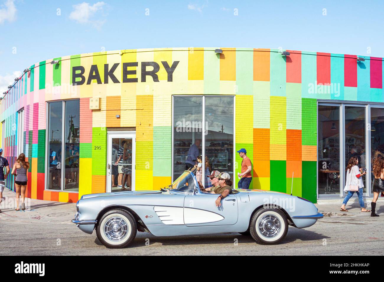 Miami Florida,Wynwood,Zak the Baker BAKERY,building outside exterior entrance colorful,classic car Chevrolet Chevy Corvette convertible Stock Photo