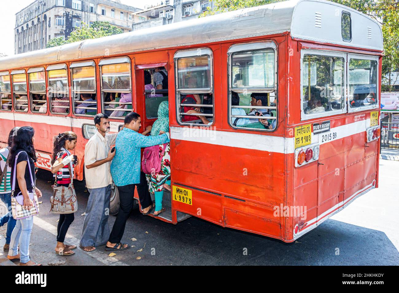 Mumbai India,Churchgate,Veer Nariman Road,BEST bus motor coach stop,men women getting on passengers riders line queue Stock Photo