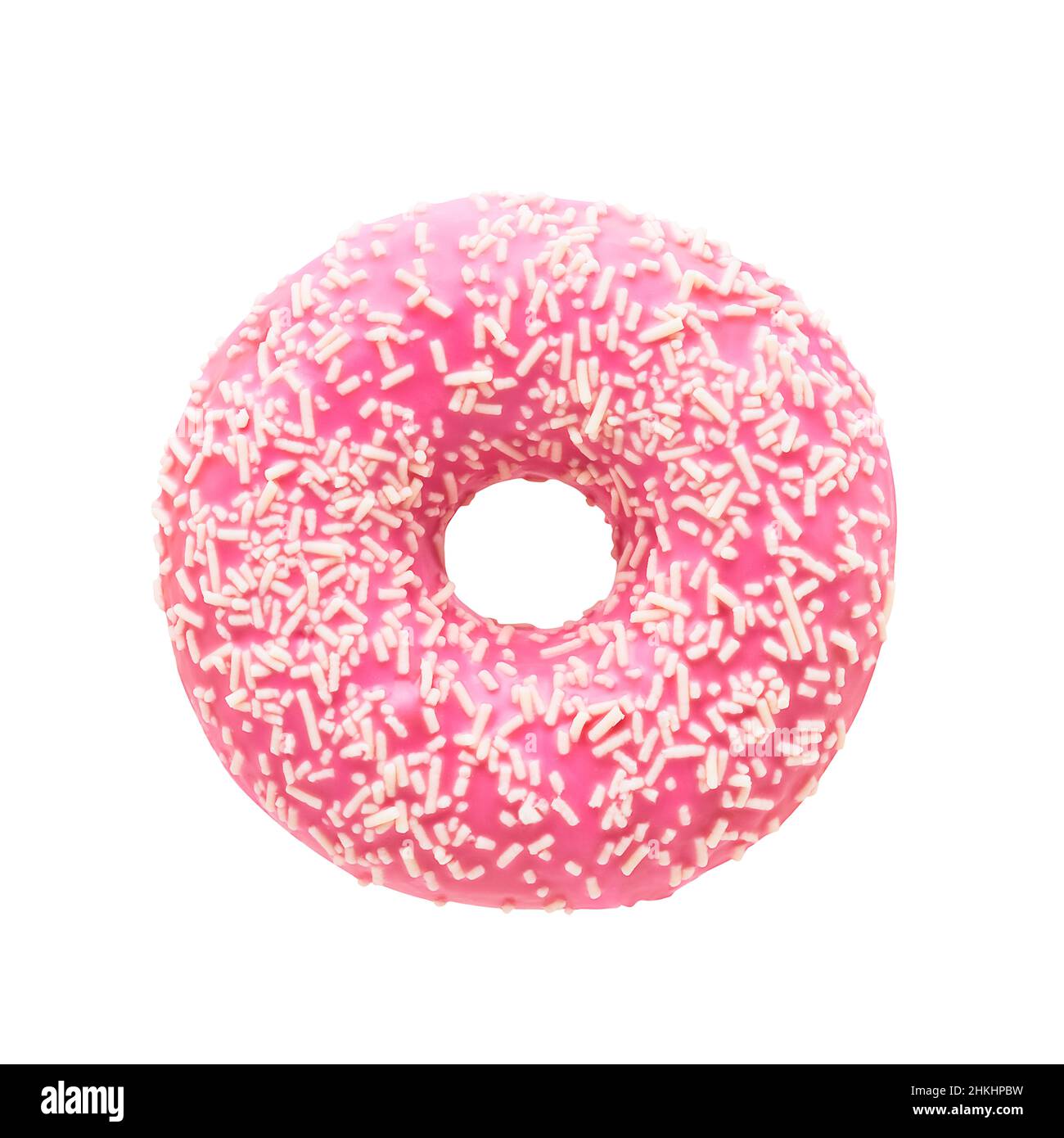 Donut in pink glaze with white sprinkles isolated over white background with clipping path. Stock Photo