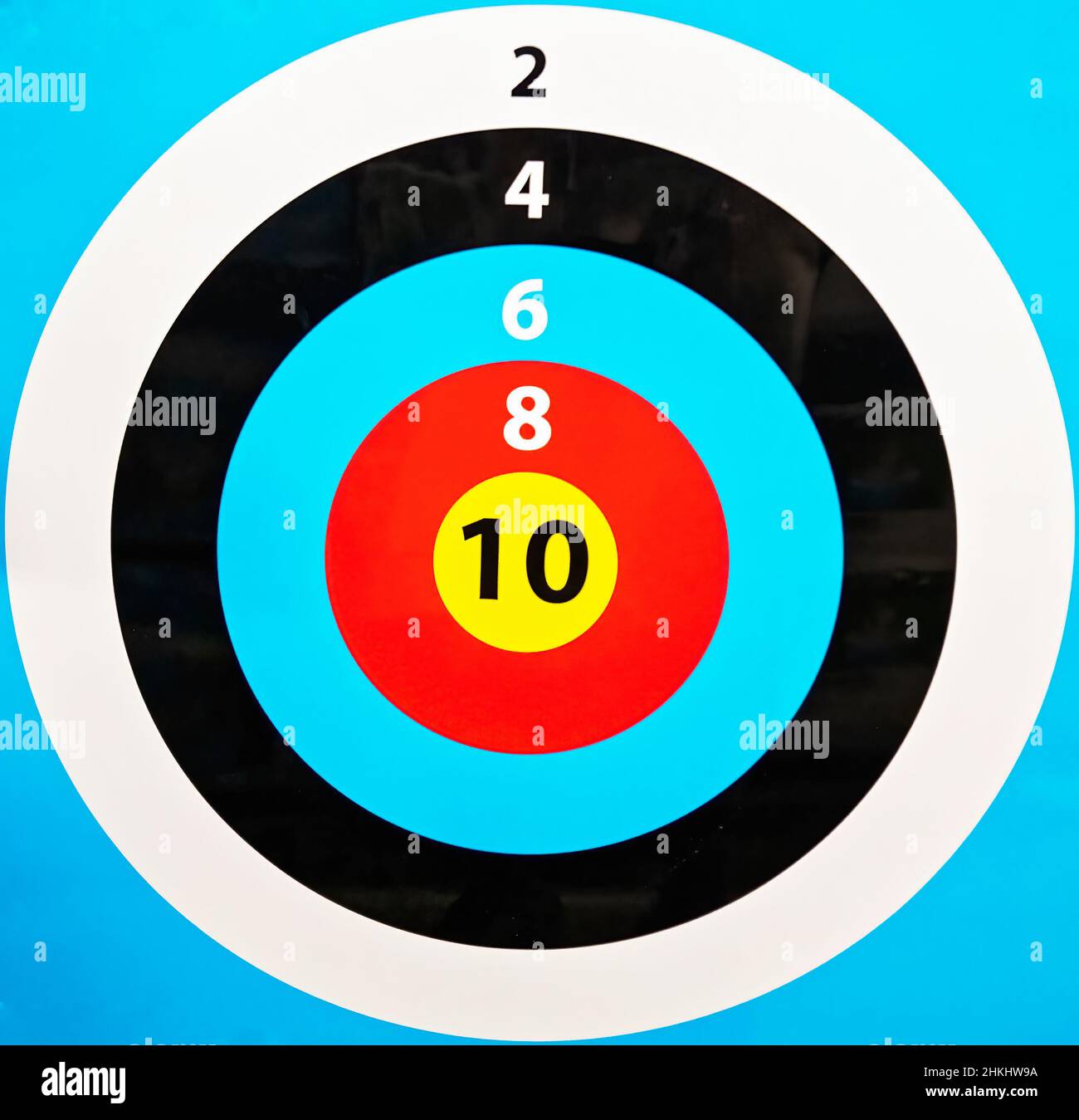 A printed bulls eye with numbers and colors, circular target Stock
