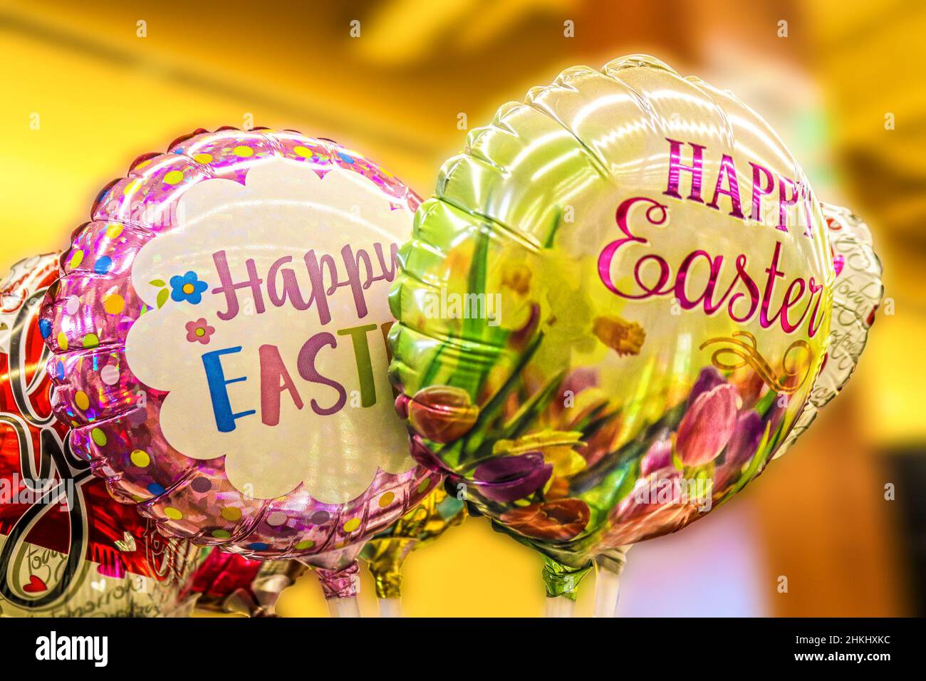 Pretty bright Easter Balloons against blurred background. Stock Photo