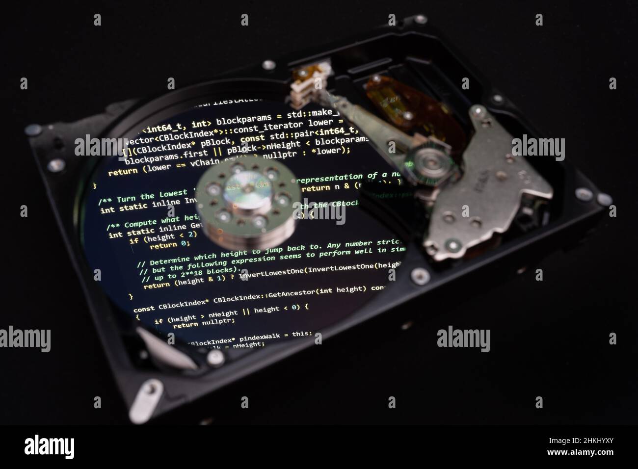 Bitcoin code reflected on a disassembled HDD Stock Photo - Alamy